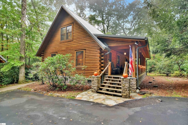 316 Hemlock Trl, Cleveland, SC 29635 - log home with covered porch and log siding