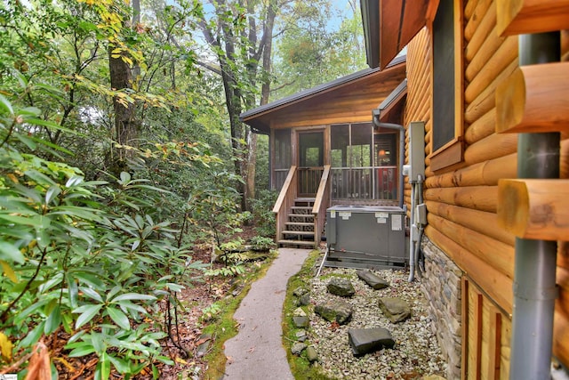 view of yard with a sunroom