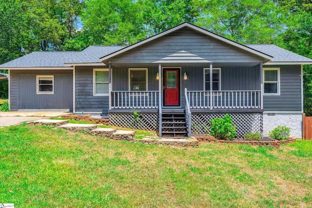 ranch-style house featuring a front yard and a porch