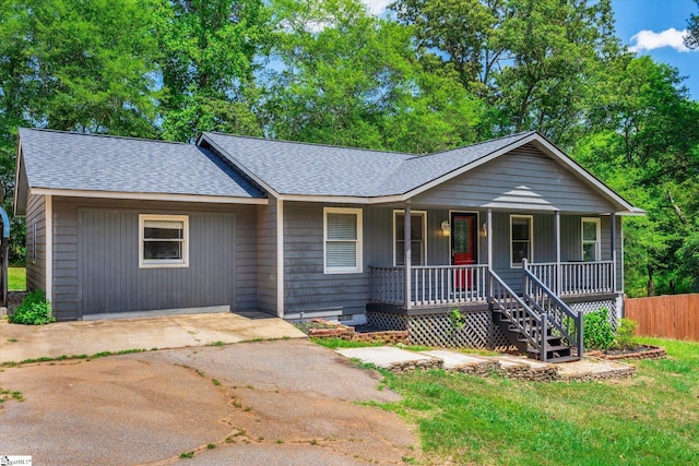 ranch-style home featuring covered porch