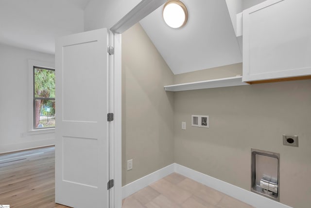 laundry area with light hardwood / wood-style flooring, hookup for an electric dryer, and washer hookup