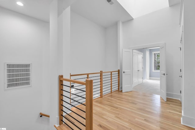 hallway featuring light hardwood / wood-style flooring