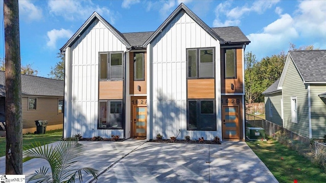 rear view of property featuring a patio area