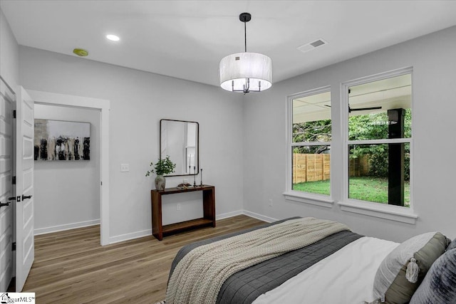 bedroom featuring wood-type flooring