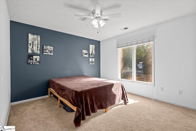 carpeted bedroom with a textured ceiling, billiards, and ceiling fan