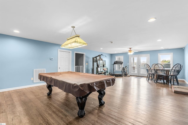 game room featuring hardwood / wood-style floors, ceiling fan, french doors, and billiards