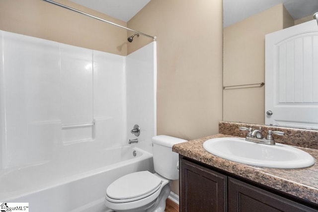 full bathroom featuring vanity, shower / washtub combination, and toilet