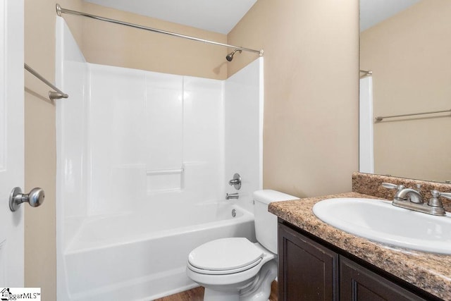 full bathroom featuring toilet, vanity, and shower / bathtub combination