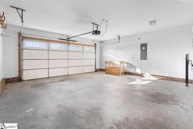 garage featuring a garage door opener and electric panel