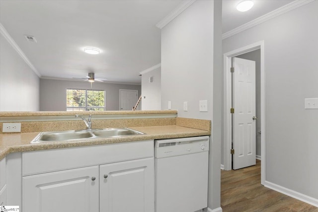 kitchen with white cabinetry, hardwood / wood-style flooring, white dishwasher, ornamental molding, and sink