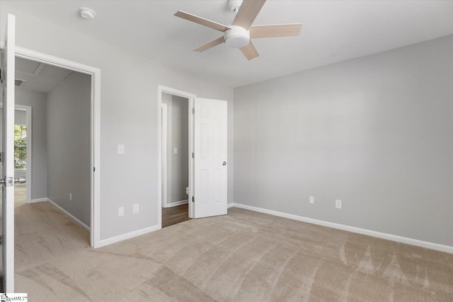 unfurnished bedroom with light carpet and ceiling fan