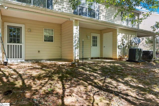 doorway to property with central AC