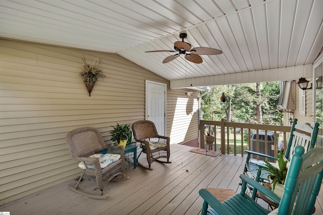 wooden deck with ceiling fan