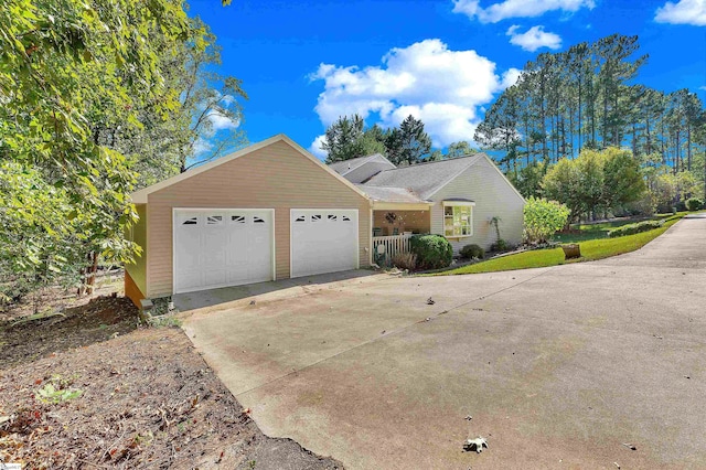 view of front of house featuring covered porch and a garage