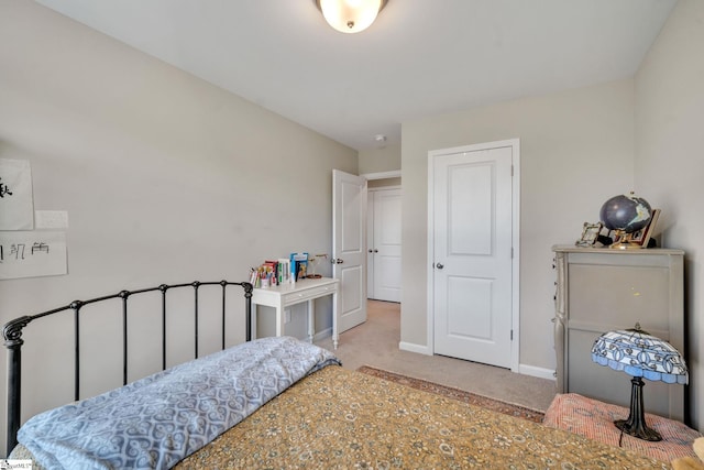 bedroom with light carpet