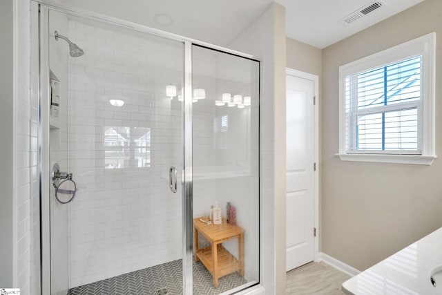 bathroom featuring walk in shower