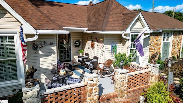 rear view of house featuring a patio