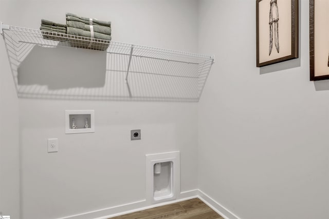 washroom featuring washer hookup, electric dryer hookup, and hardwood / wood-style flooring