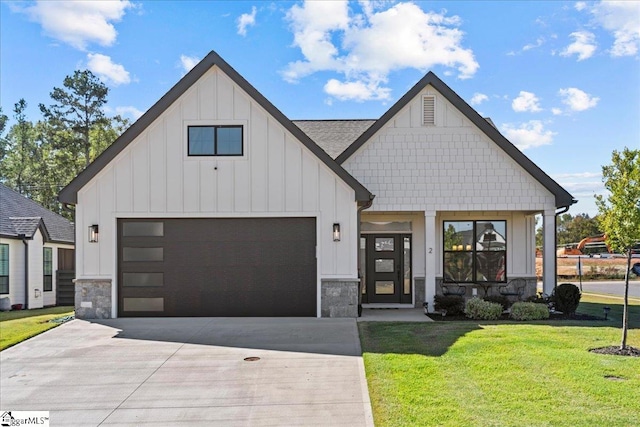 modern farmhouse with a front lawn and a garage