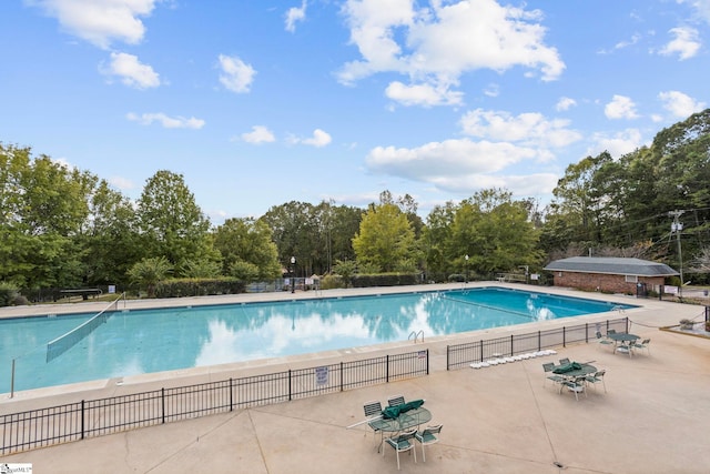 view of swimming pool with a patio