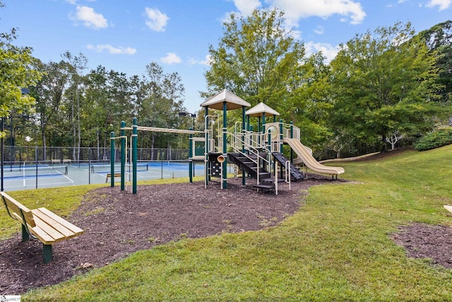 view of playground featuring a lawn