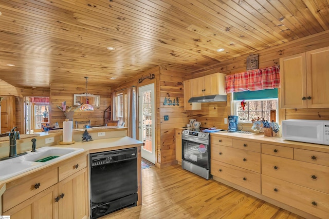 kitchen featuring wood walls, black dishwasher, electric range, and light wood-type flooring