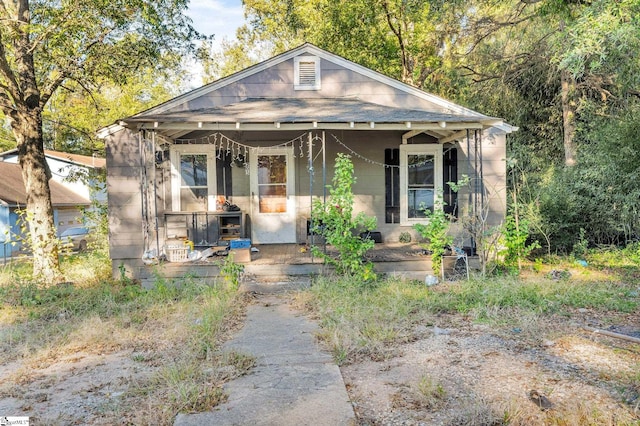 bungalow-style home with a porch