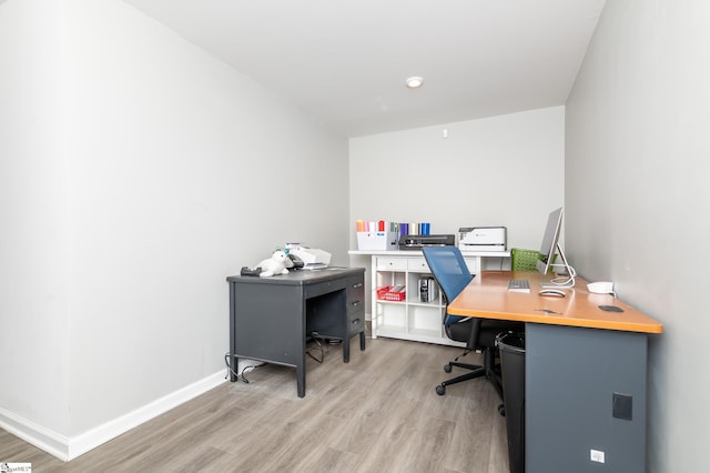 office space featuring light hardwood / wood-style floors