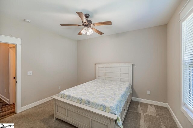 bedroom with carpet floors and ceiling fan