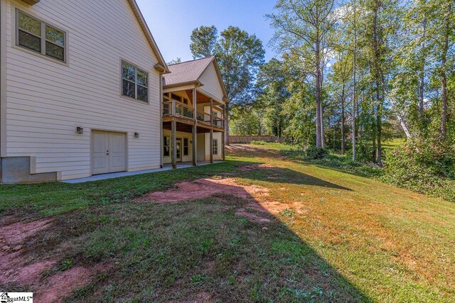 view of yard with french doors