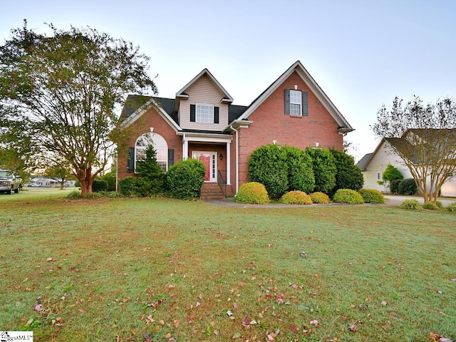 view of front facade with a front lawn