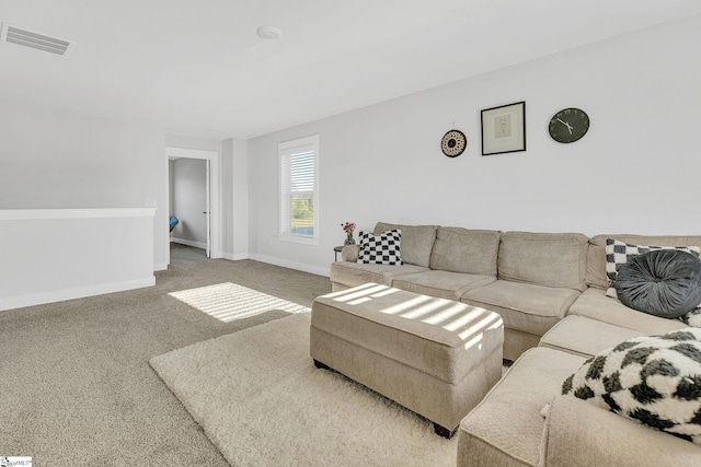 26 Shorncliffe Rd, Simpsonville, SC 29680 - carpeted living room featuring visible vents and baseboards