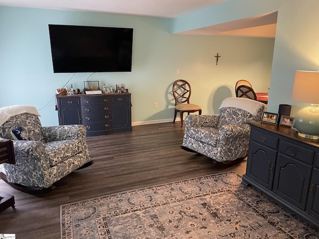 living room featuring dark hardwood / wood-style floors