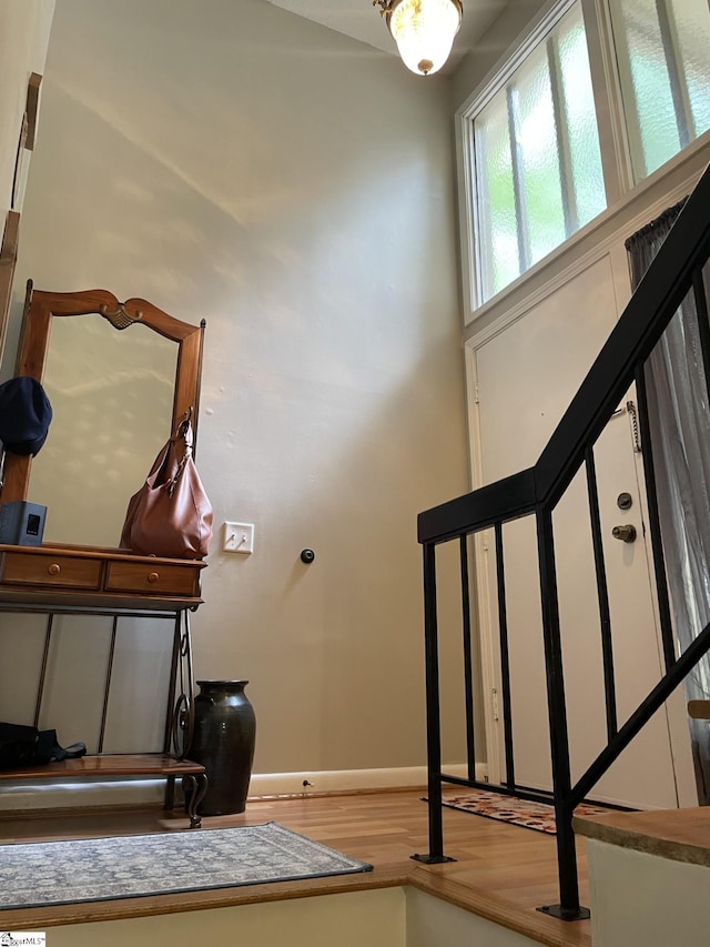 stairway featuring hardwood / wood-style flooring