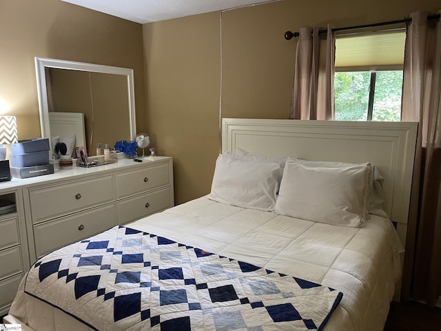 bedroom featuring a textured ceiling