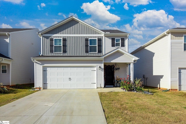 view of front facade featuring a front lawn and a garage