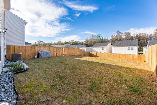 view of yard featuring central AC