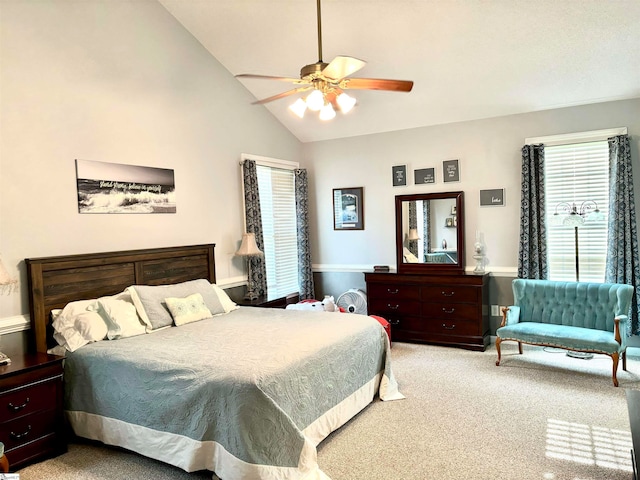 bedroom with high vaulted ceiling, carpet flooring, and ceiling fan