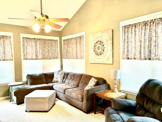 living room with ceiling fan, high vaulted ceiling, and carpet floors