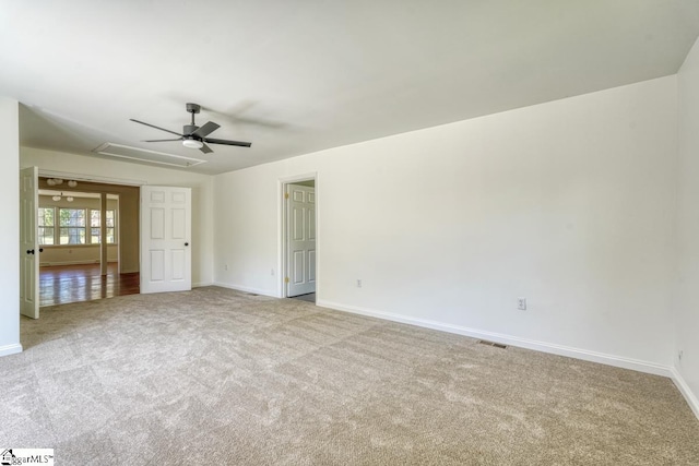 carpeted empty room with ceiling fan