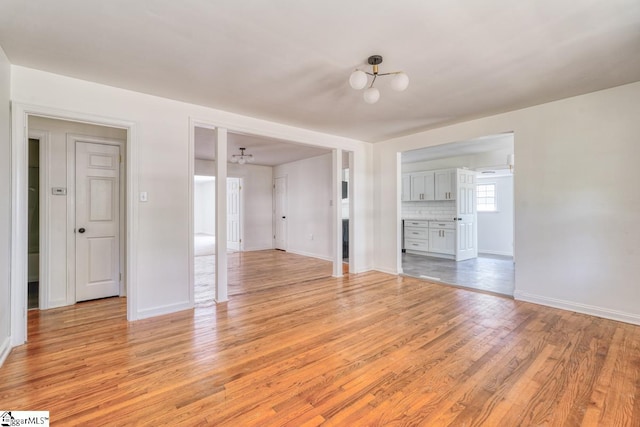 empty room with light wood-type flooring