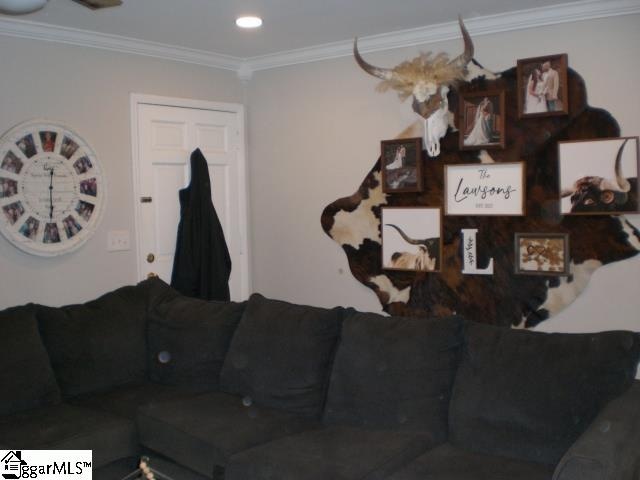 living room with crown molding