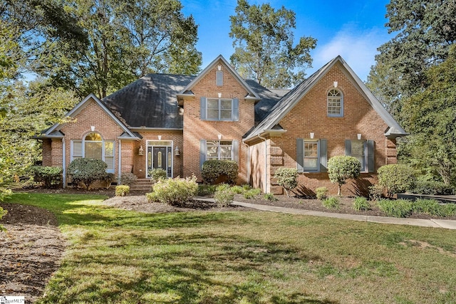 view of front property with a front lawn