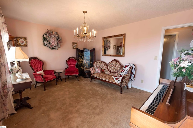 living area with an inviting chandelier and carpet