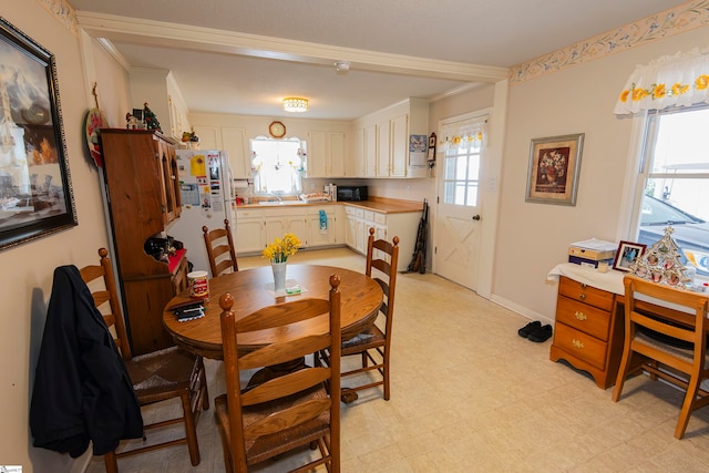 dining room featuring a wealth of natural light