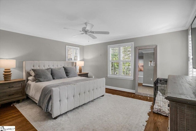 bedroom featuring ornamental molding, hardwood / wood-style floors, and ceiling fan