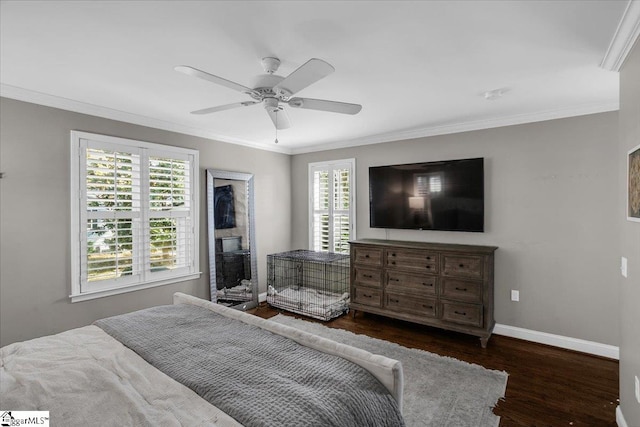 bedroom with crown molding, multiple windows, dark hardwood / wood-style floors, and ceiling fan