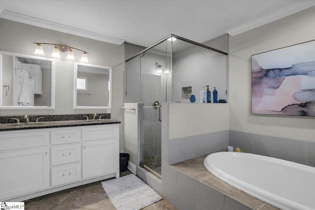 bathroom with vanity, independent shower and bath, and ornamental molding