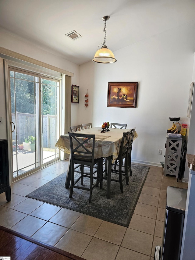 dining room with tile patterned flooring