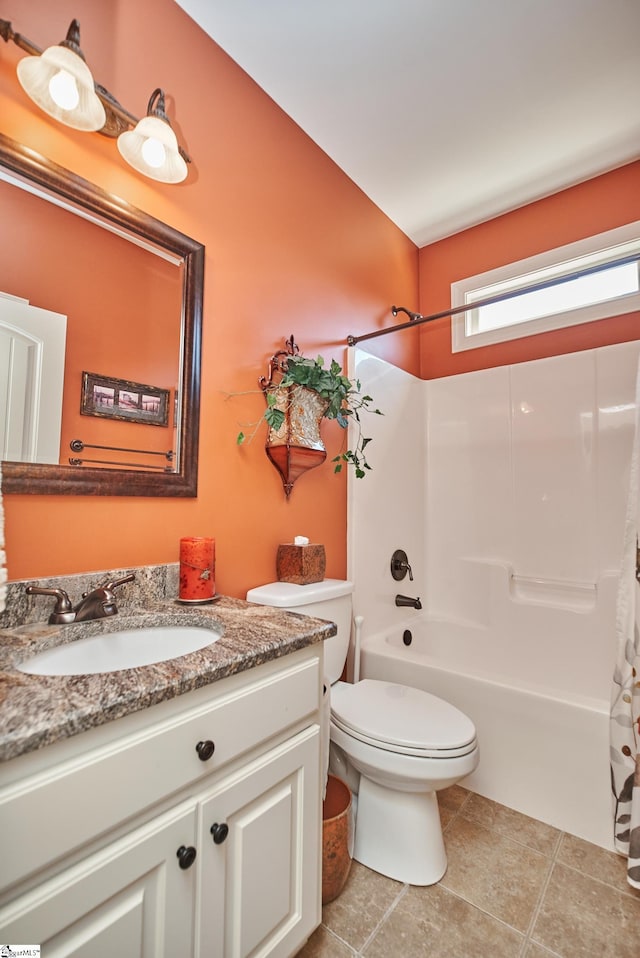 full bathroom featuring toilet, shower / tub combo with curtain, vanity, and tile patterned floors